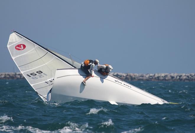 Peter Bauer, Class Admin Buttons Padin, and Chris Foley decide to check for kelp with the spinnaker up.  Foley not pictured. ©  Bronny Daniels / Joy Sailing